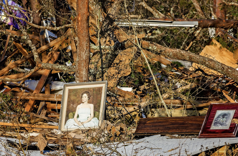 An artwork set amongst debris from a storm.